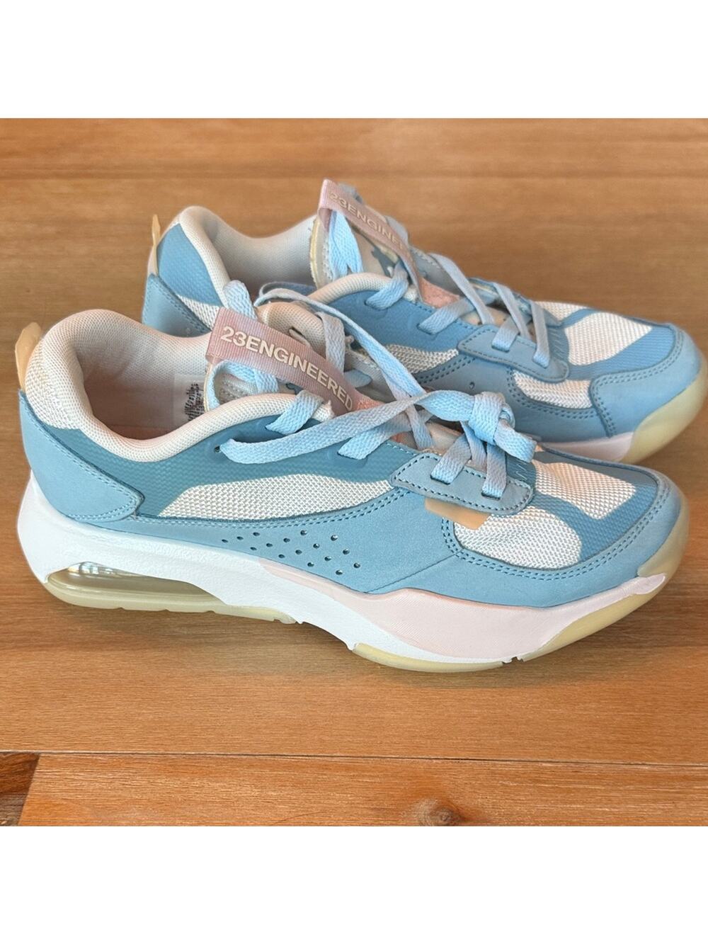 Nike Women’s Jordan Air 200e Sneakers. Summit White, Worn Blue and Atmosphere